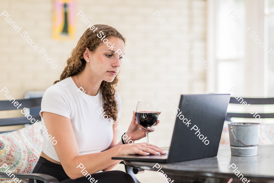 A young lady enjoying daylight at home stock photo with image ID: 00d57ca8-0bb2-48cc-b43a-d15d7b8b6b1d