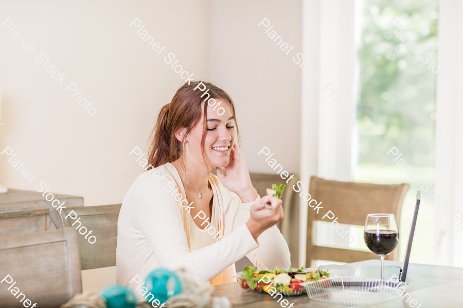 A young lady having a healthy meal stock photo with image ID: 04a98a3a-c94d-4c8b-b1d7-303bc7b9de93