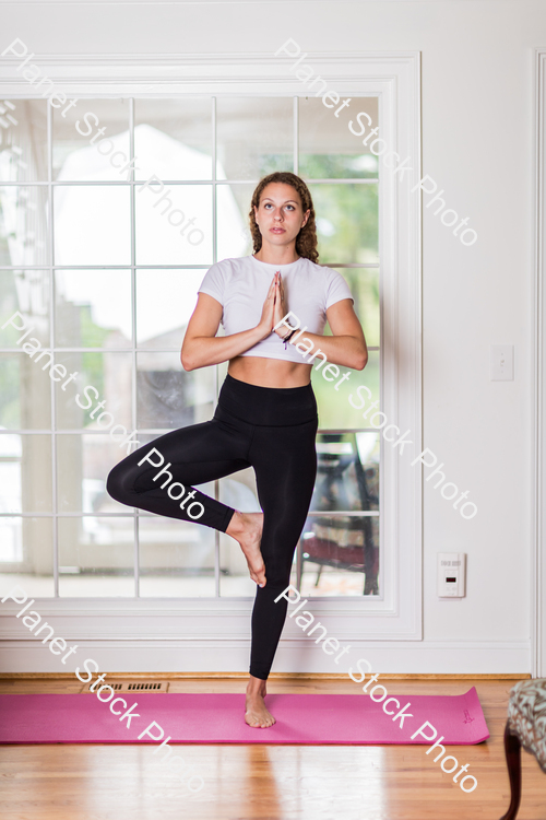 A young lady working out at home stock photo with image ID: 0a407824-ee57-4225-a823-263c21b45b51