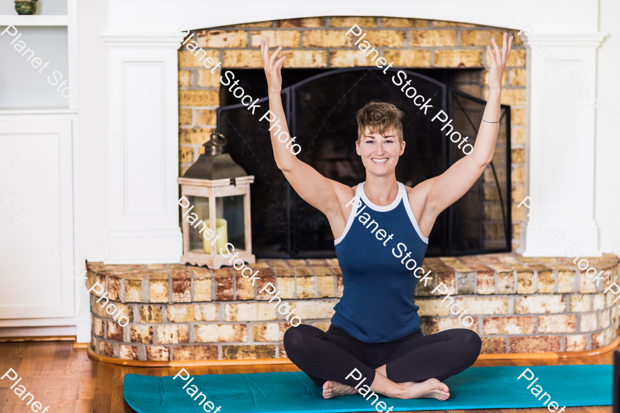 A young lady working out at home stock photo with image ID: 0c5fcd61-9938-4543-b2ad-3491d9de2132