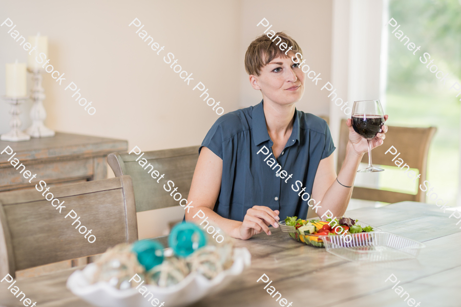 A young lady having a healthy meal stock photo with image ID: 0dbe1e84-498c-4a2f-809e-2e902a8b4147