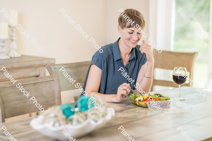 A young lady having a healthy meal stock photo with image ID: 0f349555-3a87-4fdd-aab2-1b59375cca1c