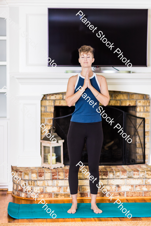 A young lady working out at home stock photo with image ID: 15671009-297b-4f1b-8f49-62f61c9eeff6