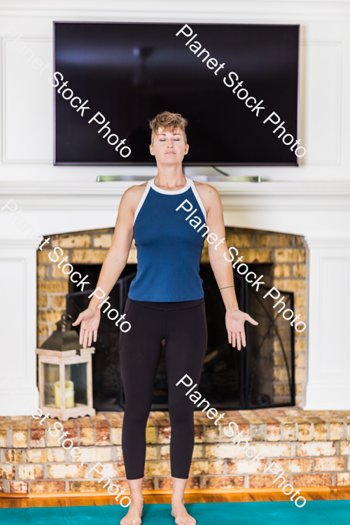 A young lady working out at home stock photo with image ID: 205d1647-faeb-4195-834d-7a6b82a8b72b