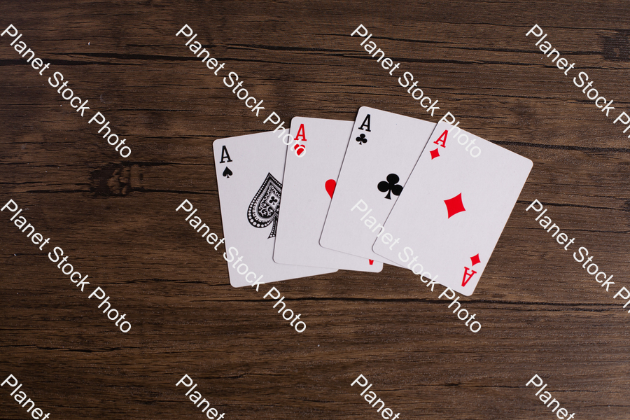 Four aces playing cards. Four playing cards of the same rank stock photo with image ID: 262d5780-f041-4c2a-a3f3-2e208be321dc