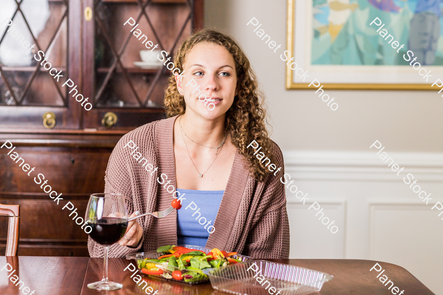 A young lady having a healthy meal stock photo with image ID: 28a17266-570f-4ebf-a5ab-19350a40ffa1