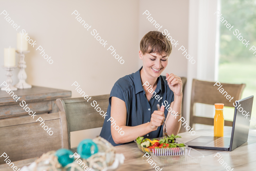 A young lady having a healthy meal stock photo with image ID: 2b3e9b87-1de0-447c-9fca-9eec078e5b27