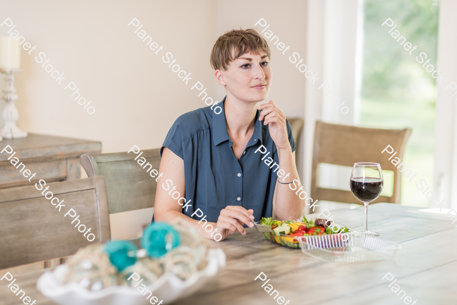 A young lady having a healthy meal stock photo with image ID: 2fa859d1-3d8b-4c09-bcde-3be89d33971c
