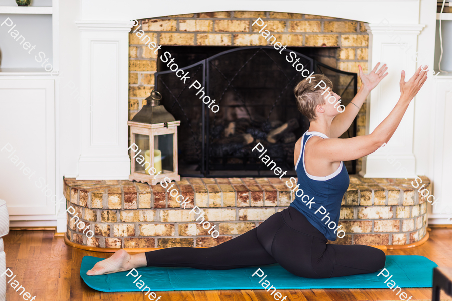 A young lady working out at home stock photo with image ID: 2fca3d2d-deb2-4e06-974f-794f56293e76