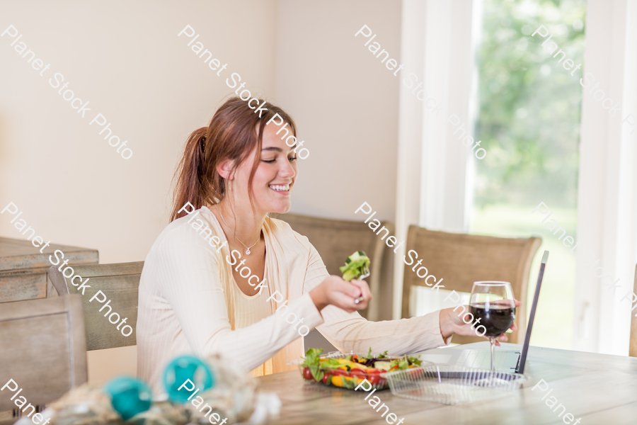 A young lady having a healthy meal stock photo with image ID: 303f10e9-dcd1-4cda-af1a-1ee7c67a3894