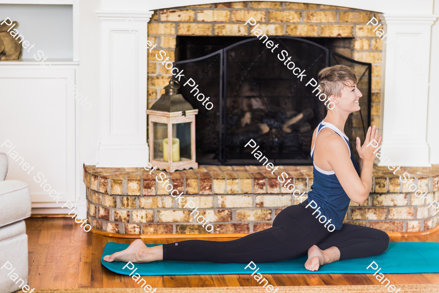 A young lady working out at home stock photo with image ID: 367f6937-7c52-4aab-a38a-859bf071ed70