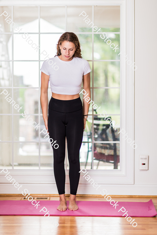 A young lady working out at home stock photo with image ID: 37cbe04a-4a3a-416b-afe5-b39ebea5ae0e