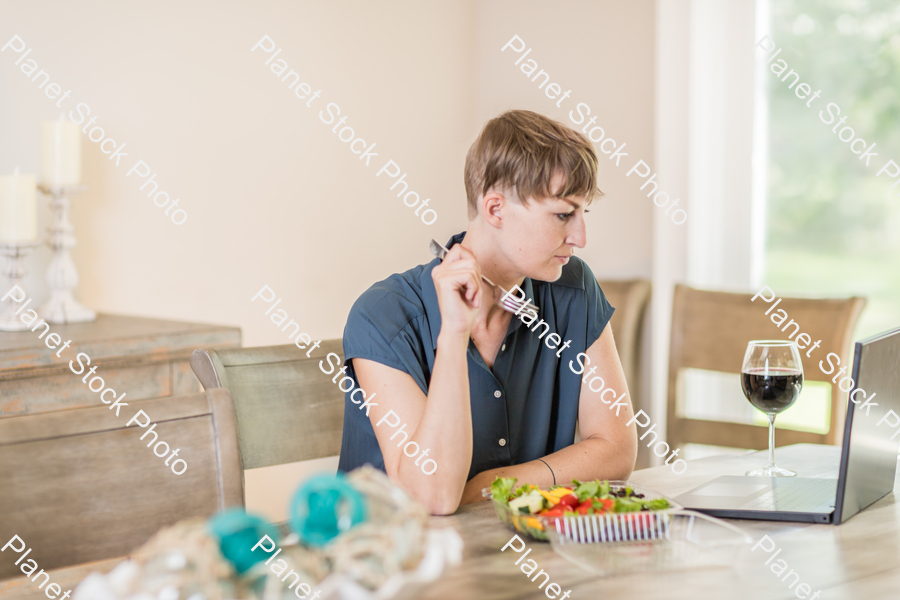 A young lady having a healthy meal stock photo with image ID: 3f02027a-54ce-4771-89aa-ae273fa29f74