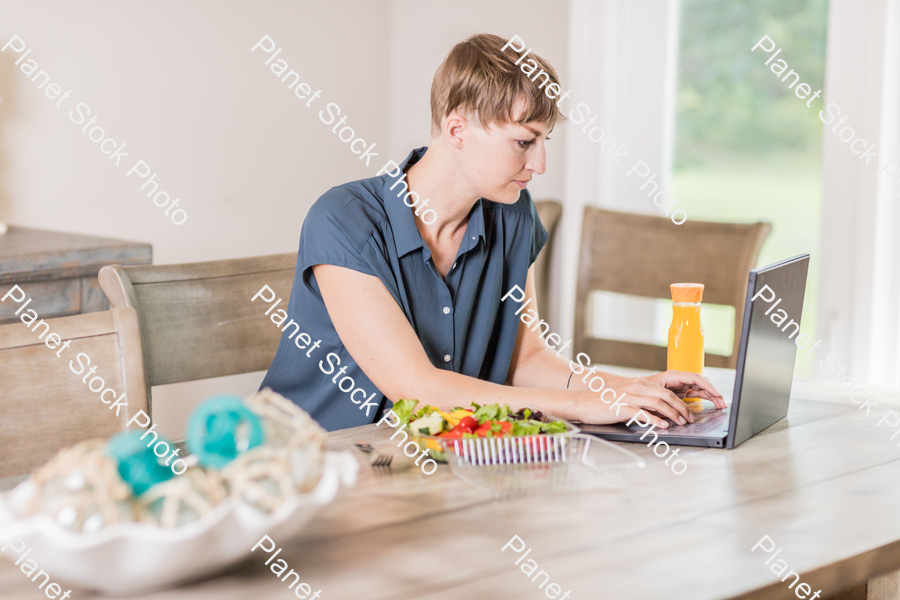 A young lady having a healthy meal stock photo with image ID: 440374eb-9201-45c7-88c9-5235f4b11b45