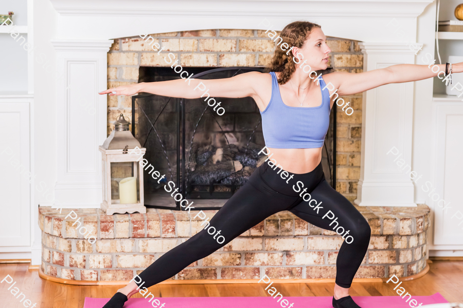 A young lady working out at home stock photo with image ID: 520eb7d0-dfc0-4808-8a6b-4f2608179bcc
