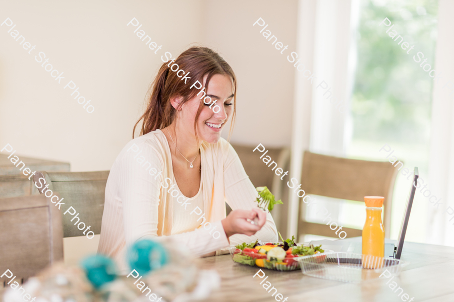 A young lady having a healthy meal stock photo with image ID: 5c39d7c9-3fbd-49b5-9c28-442d4fb5cfee