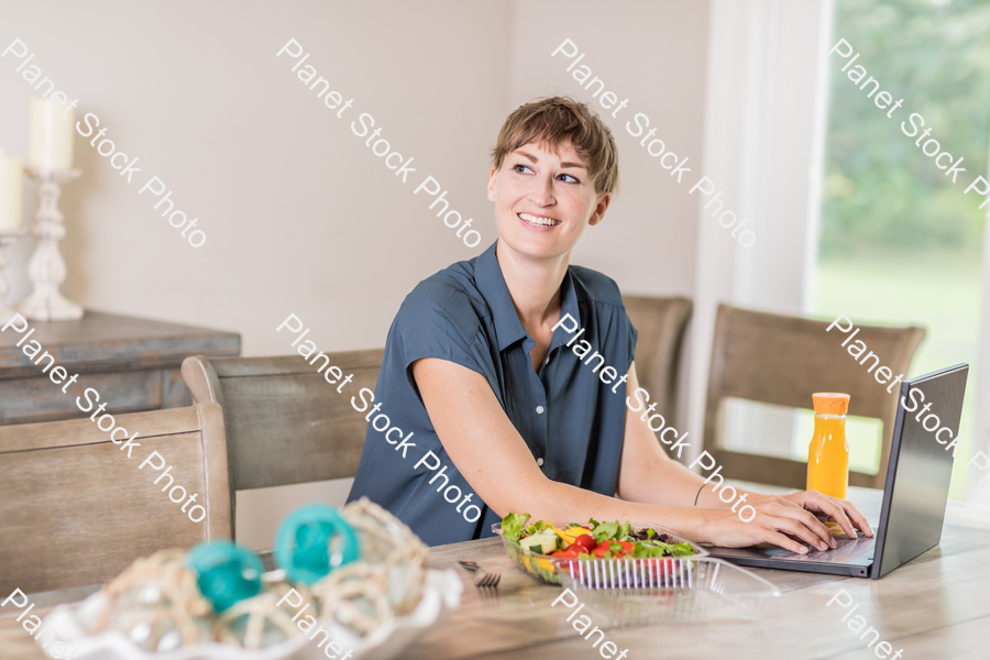 A young lady having a healthy meal stock photo with image ID: 5cee2c3a-c087-4fa0-9915-f833f3368c4a