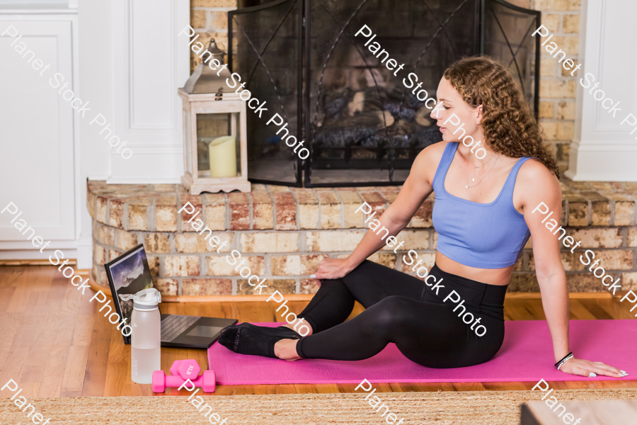 A young lady working out at home stock photo with image ID: 63abcf61-3369-4edf-abf2-c70a95f03e5b