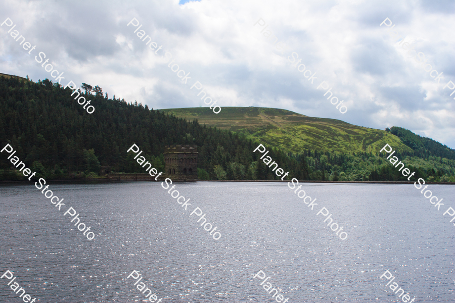 The Derwent dam under a blue sky stock photo with image ID: 75088ace-5605-498f-8e4f-c5e18ae751e5