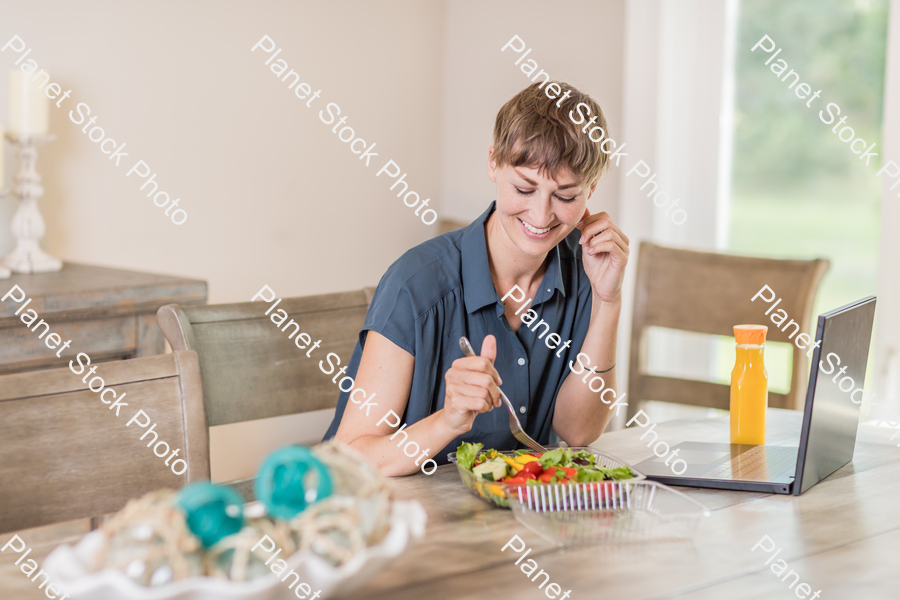A young lady having a healthy meal stock photo with image ID: 757f2e23-d9ca-47f6-9858-67ce8b19925e