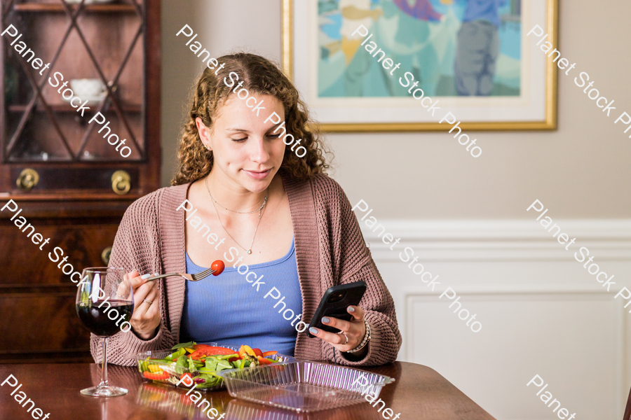 A young lady having a healthy meal stock photo with image ID: 7751de72-9d56-460c-80ac-f8367f8a0db7