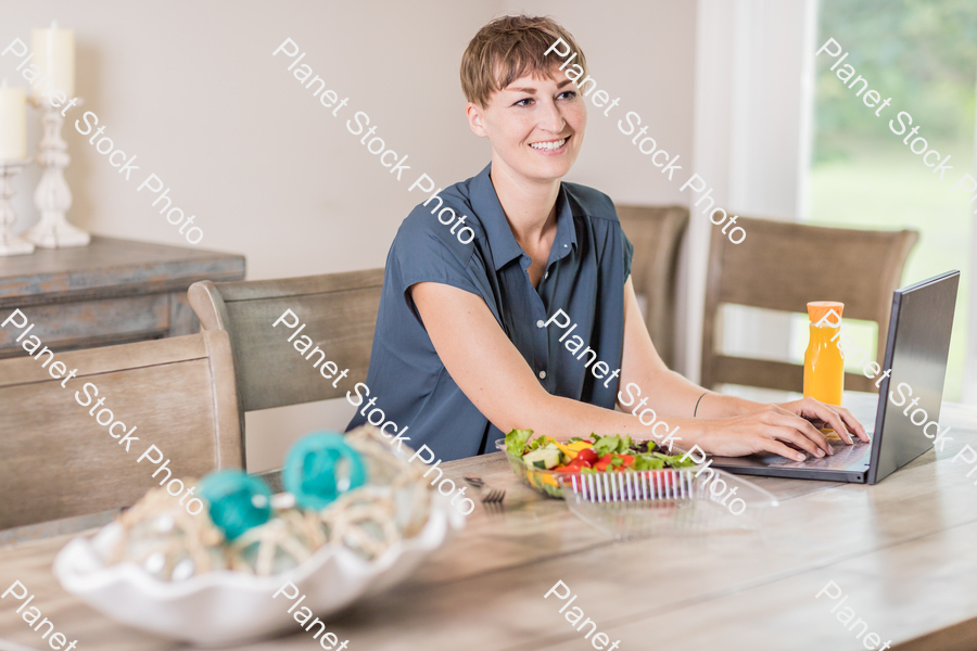 A young lady having a healthy meal stock photo with image ID: 7da3ff37-b7be-4c75-885f-fc333712a412