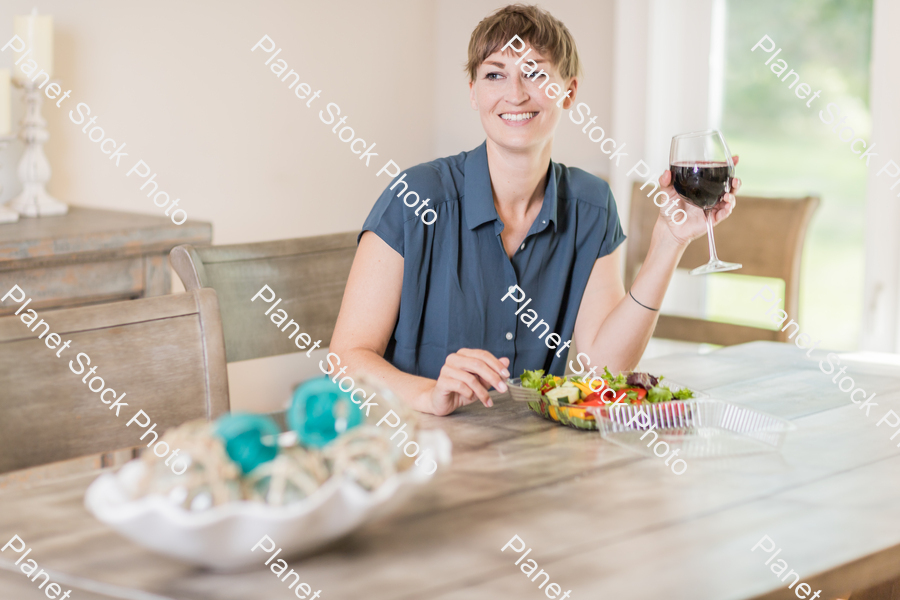A young lady having a healthy meal stock photo with image ID: 8047c4a4-6aa7-4758-8643-f90760f6a4b6