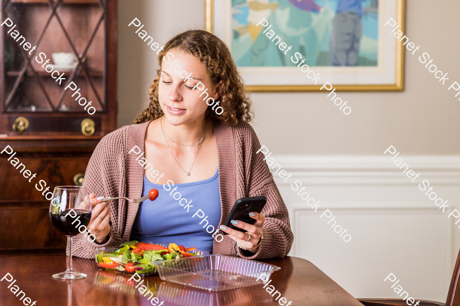 A young lady having a healthy meal stock photo with image ID: 82b4c9fd-d944-4492-b63a-133da1c4ded8