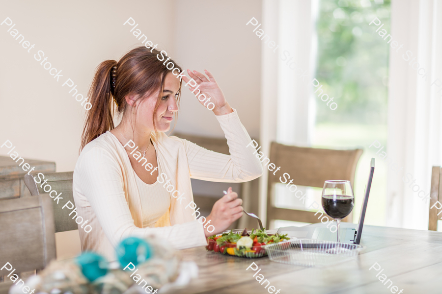 A young lady having a healthy meal stock photo with image ID: 834ebe3e-ae0f-4dc4-95e6-366b211250ec