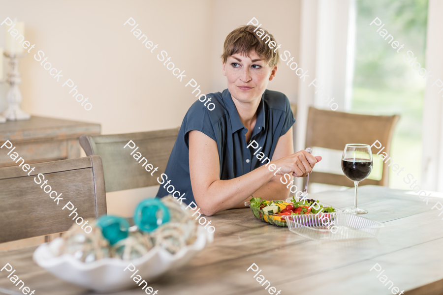 A young lady having a healthy meal stock photo with image ID: 8f371472-7fc5-41b5-a64c-872cf762d16d