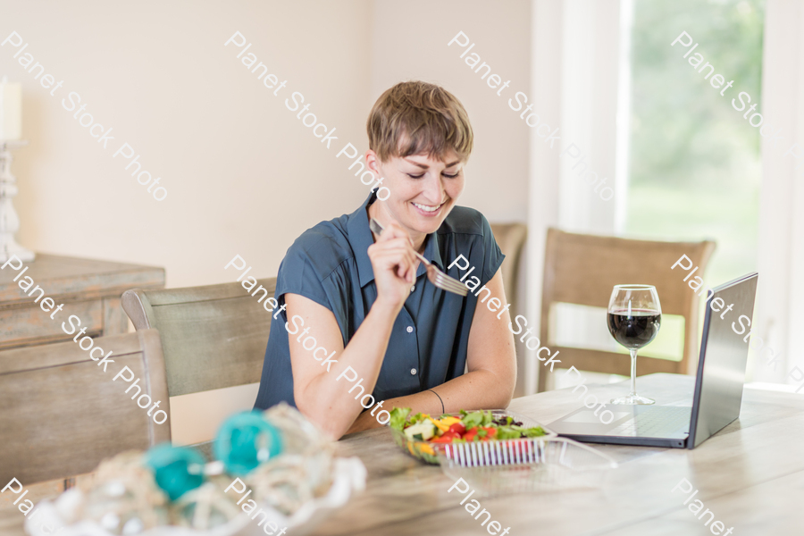 A young lady having a healthy meal stock photo with image ID: 8f5e1692-0bb9-44c4-b89a-f8d2128b29ff