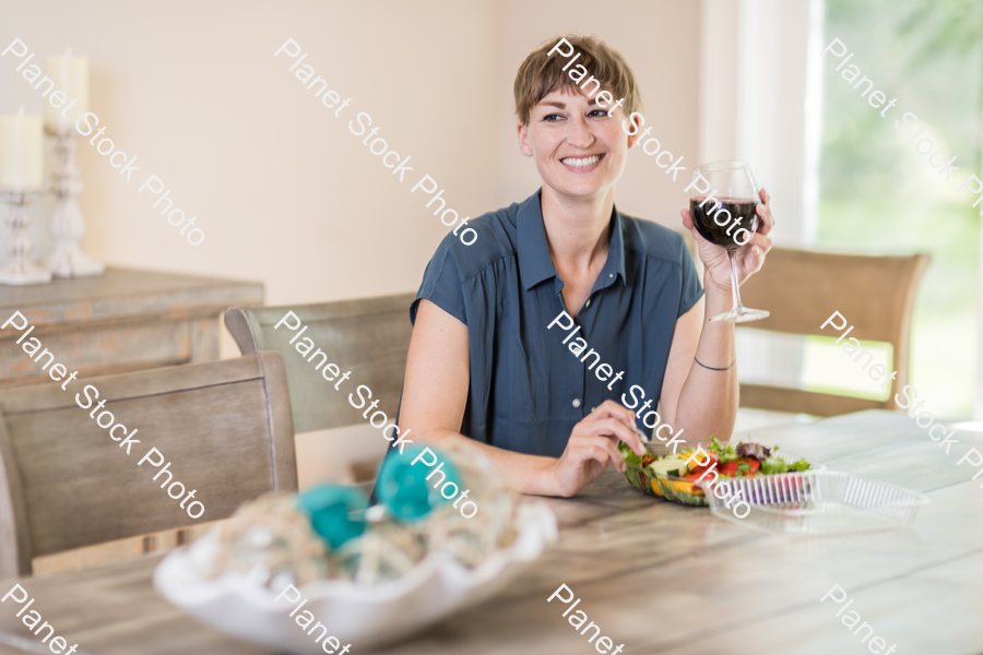 A young lady having a healthy meal stock photo with image ID: 91ebf206-4632-4056-98a1-d7d0b0a38174
