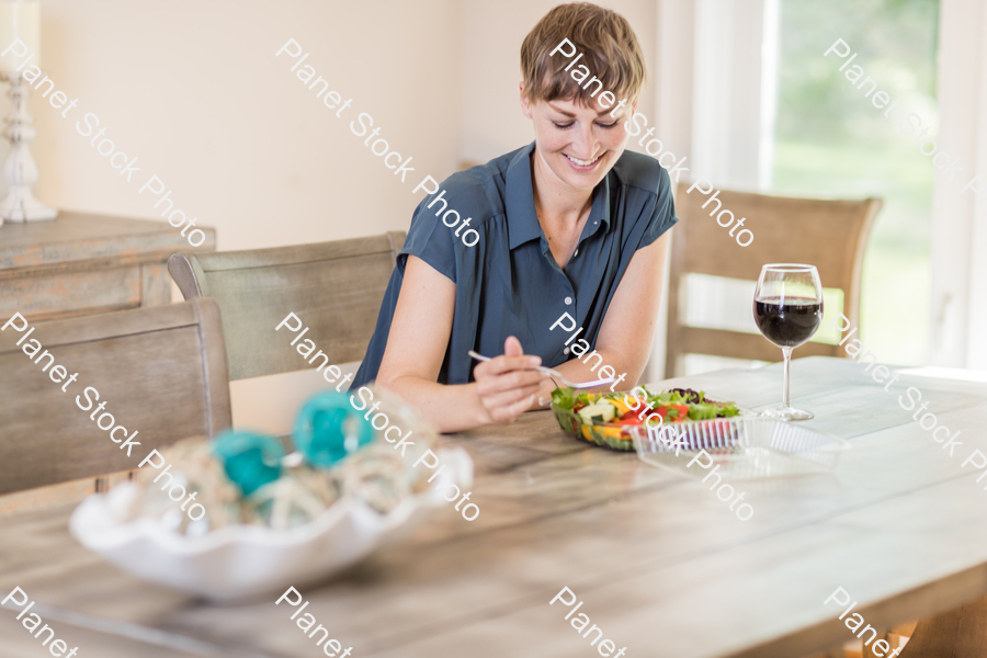 A young lady having a healthy meal stock photo with image ID: 9fab7fc5-b65f-419f-a192-10f34795784a