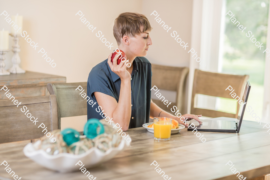 A young lady having a healthy breakfast stock photo with image ID: a5744713-034d-40e7-85ea-65af363450c0