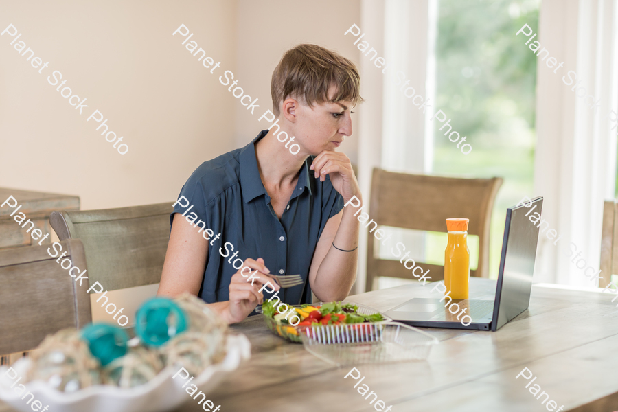 A young lady having a healthy meal stock photo with image ID: a7baed73-a03c-42bb-b339-7222d7fcab03