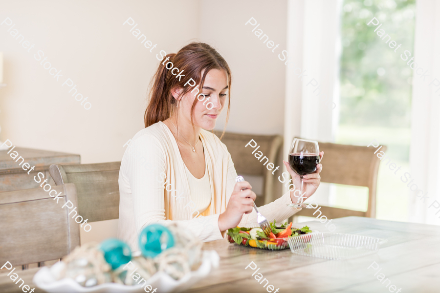 A young lady having a healthy meal stock photo with image ID: acc7cb71-7db7-4bd2-91a1-58f41cab2325