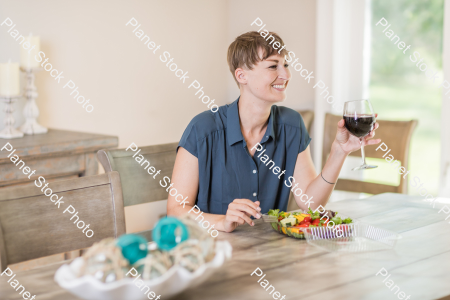 A young lady having a healthy meal stock photo with image ID: b1cffeed-24de-4417-a718-319a8c73216b