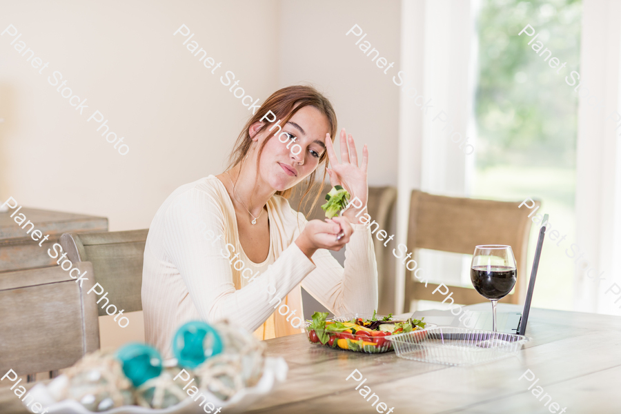 A young lady having a healthy meal stock photo with image ID: be2498b3-7065-427a-8ef1-25d9221fae20