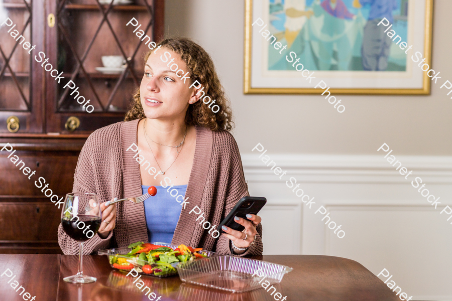 A young lady having a healthy meal stock photo with image ID: befa51b9-3a65-4aa8-9ed4-cde610636eb9