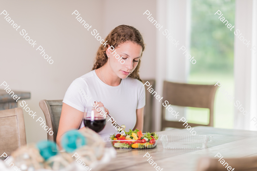 A young lady having a healthy meal stock photo with image ID: c20b0b4e-265f-4f1f-8894-262058f26548