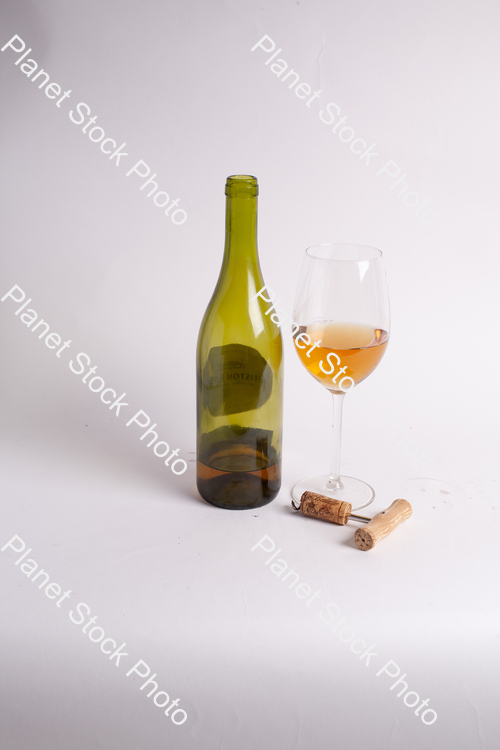 One bottle of white wine, with wine glass, and corkscrew stock photo with image ID: c46f436c-3eca-4c4c-b790-9f9e5207923e