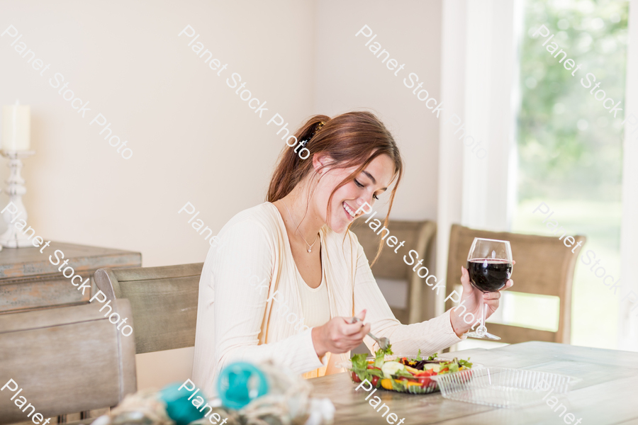 A young lady having a healthy meal stock photo with image ID: c7f25470-8b16-44e8-9842-9f39a27d5577