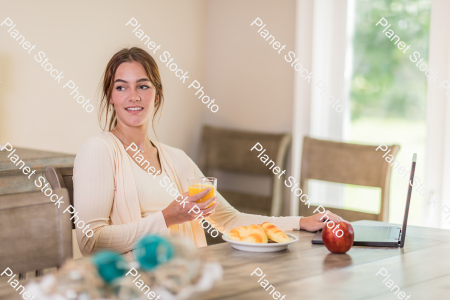 A young lady having a healthy breakfast stock photo with image ID: ca626e8e-dfe2-48d0-a1bf-902ae1cbf741