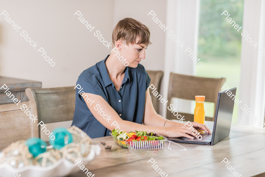 A young lady having a healthy meal stock photo with image ID: cc63030c-7dea-42f4-9a64-709943f6db92