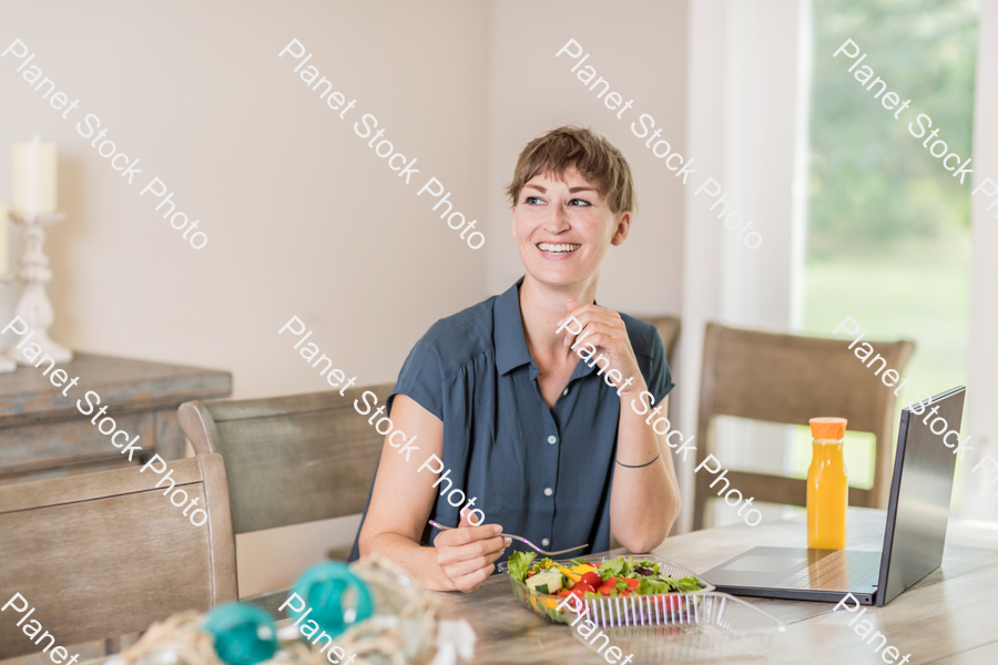A young lady having a healthy meal stock photo with image ID: d66c6d22-1c16-4457-a80d-39cc12546230