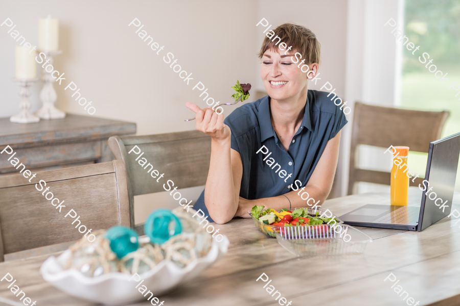A young lady having a healthy meal stock photo with image ID: d7060593-8681-4d35-9e81-b6919a828b46