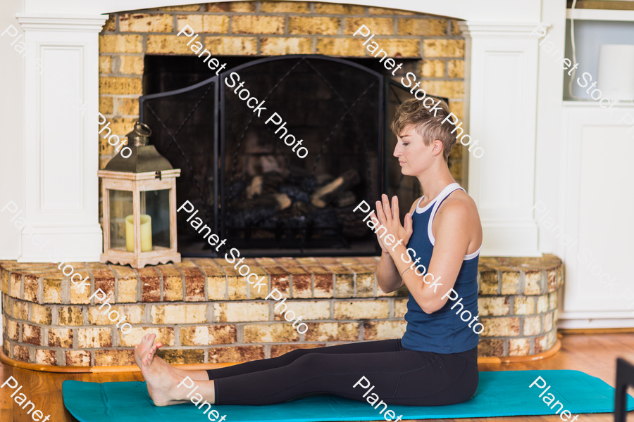 A young lady working out at home stock photo with image ID: d7acbe52-9cd3-4164-84fb-523bd35e9dbc