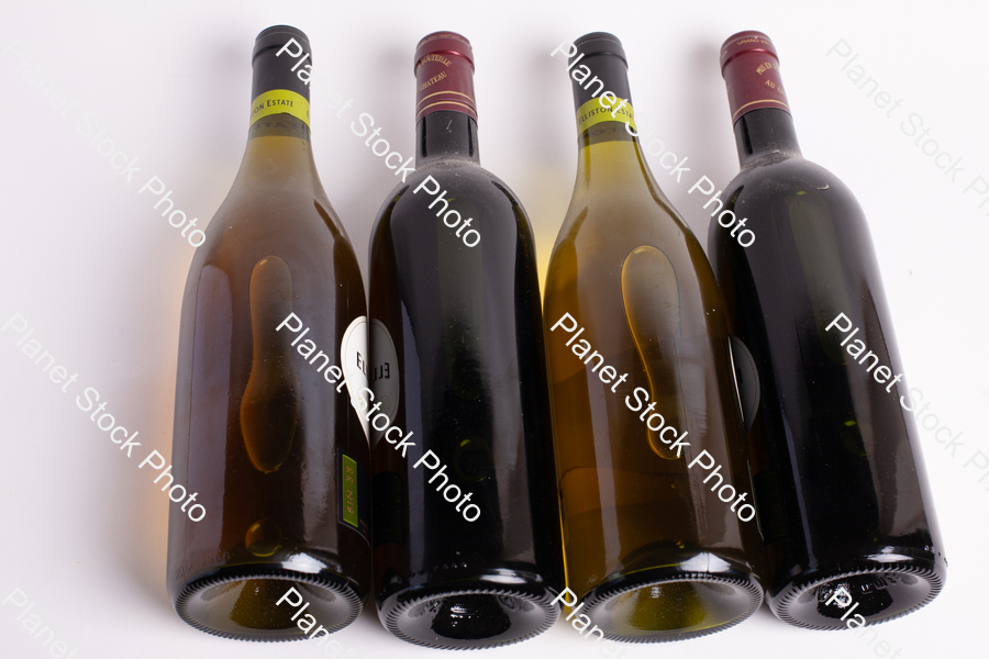 Four bottles of wine stock photo with image ID: db4bfb74-b585-4484-aac4-bf321e3c1c3b