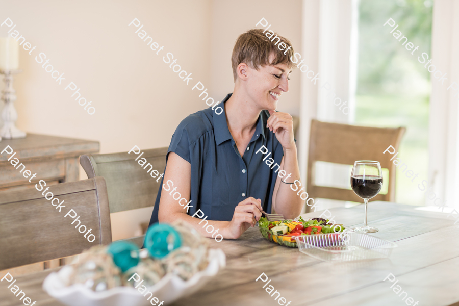 A young lady having a healthy meal stock photo with image ID: dd7e3eb0-35c2-48fd-970d-c42dbb072b02