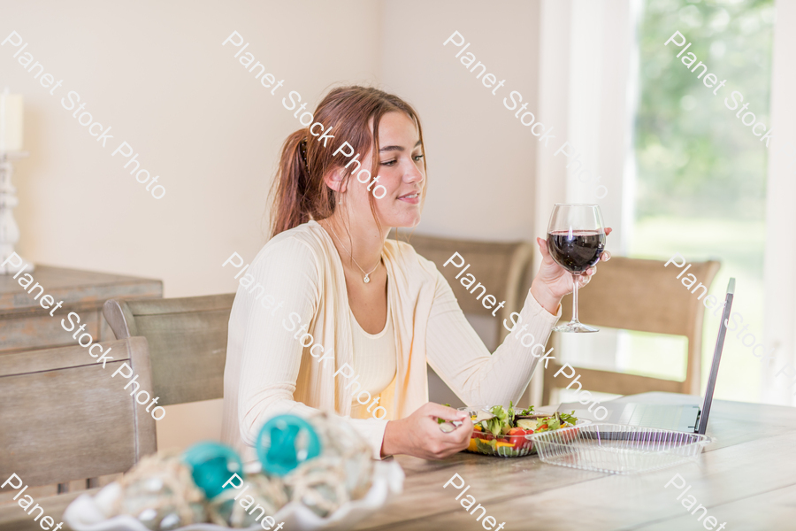 A young lady having a healthy meal stock photo with image ID: e34cb4b2-225b-4043-ae70-58fc6c368d47